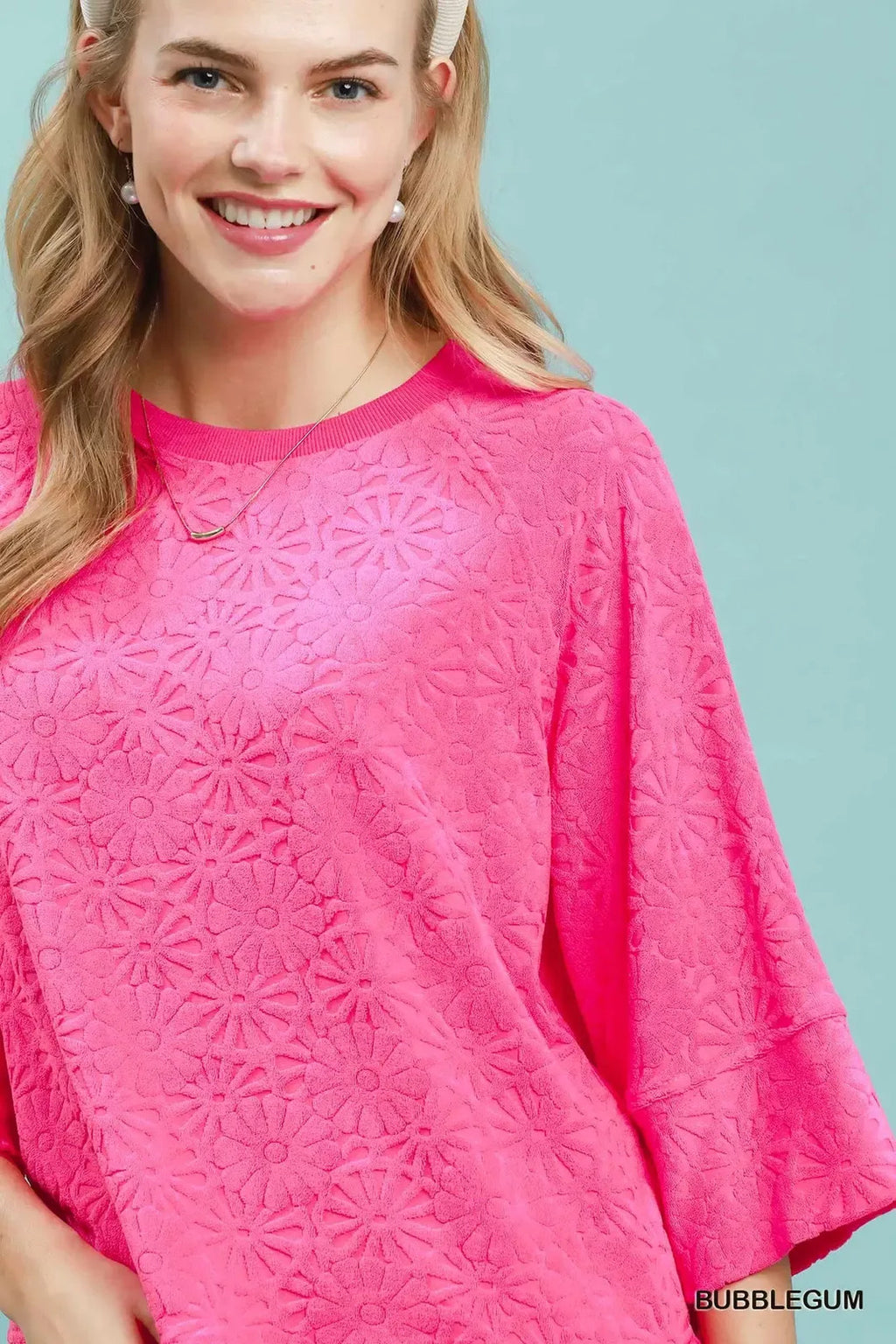 Round Neck Textured Floral Terry Blouse.