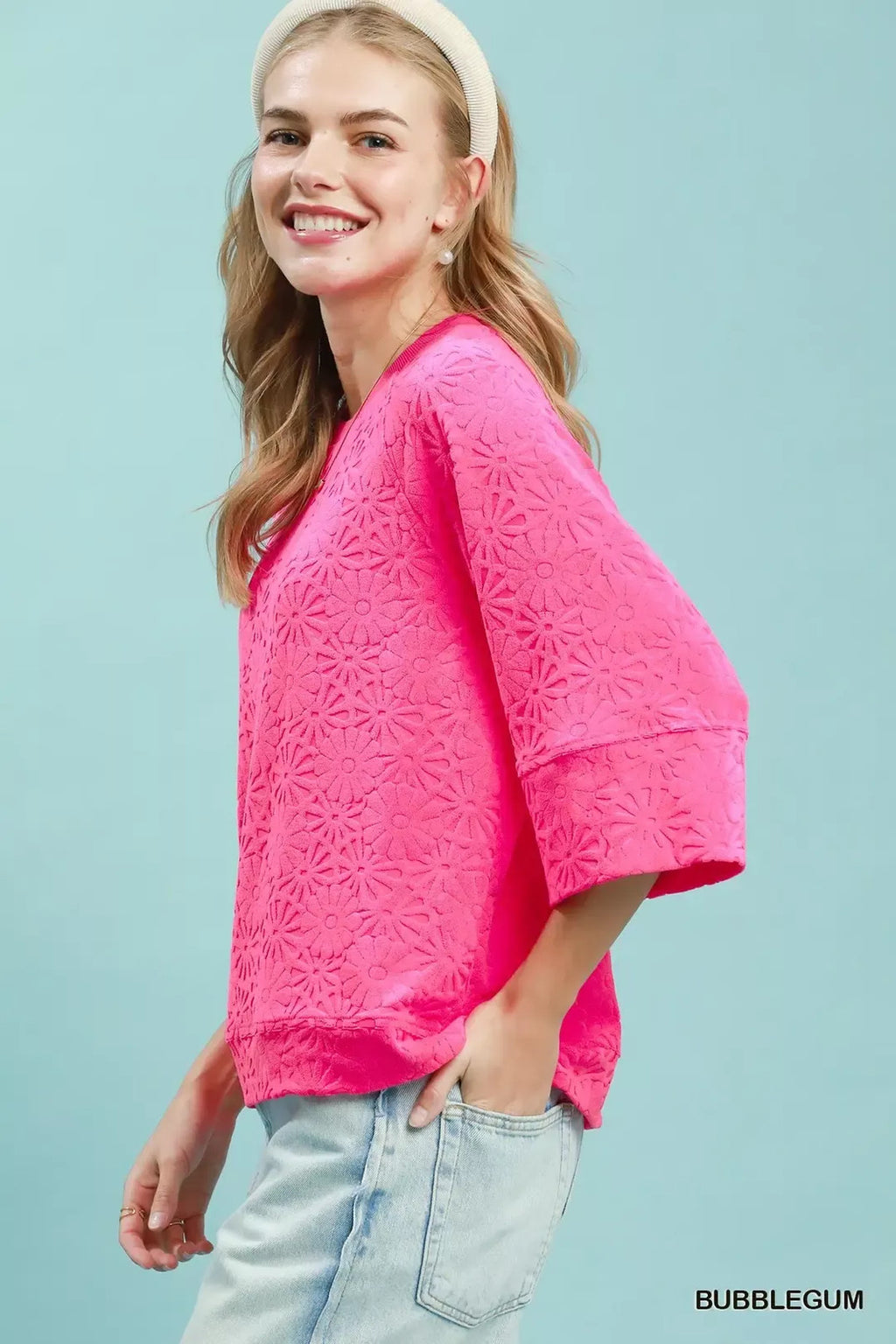 Round Neck Textured Floral Terry Blouse.