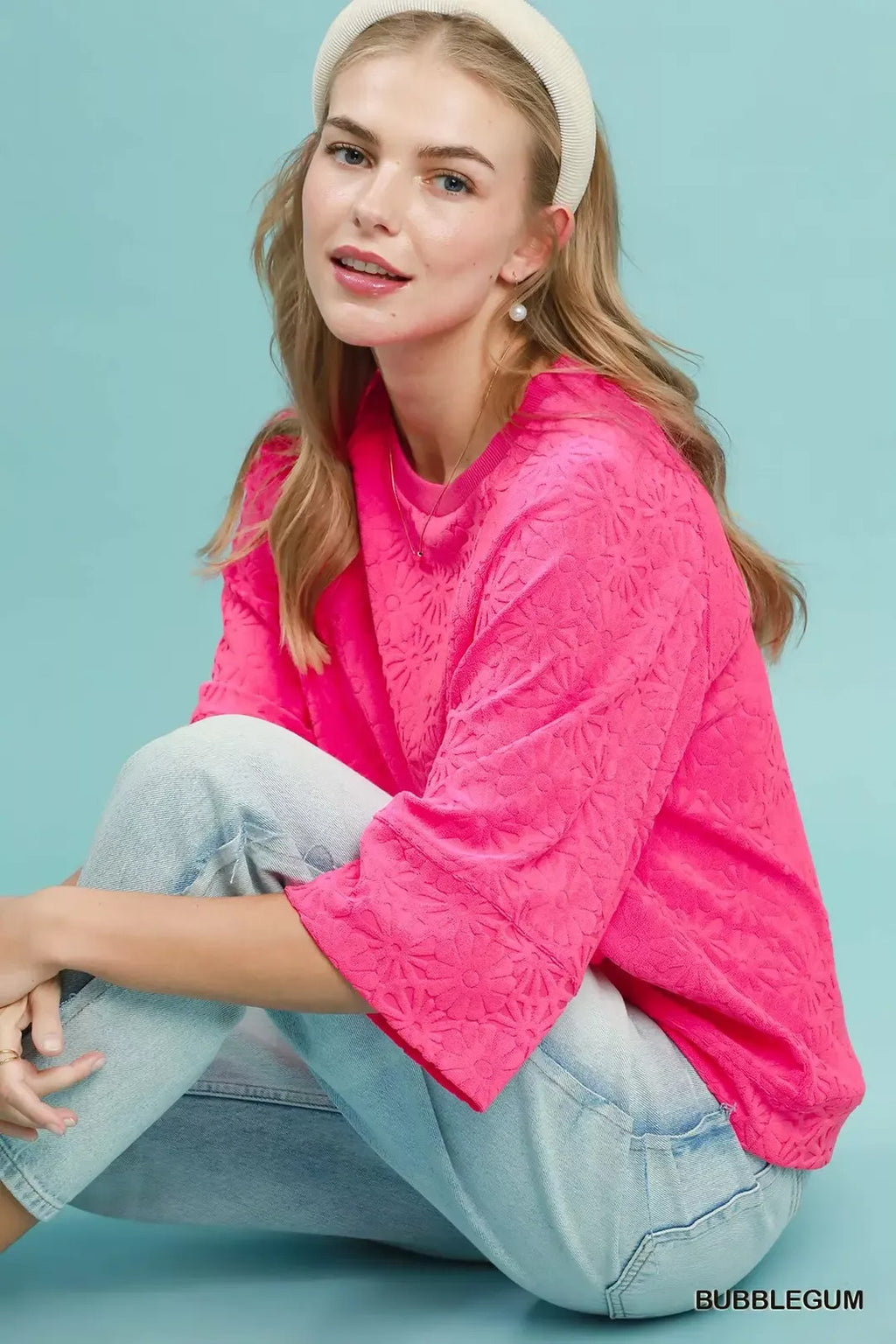 Round Neck Textured Floral Terry Blouse.