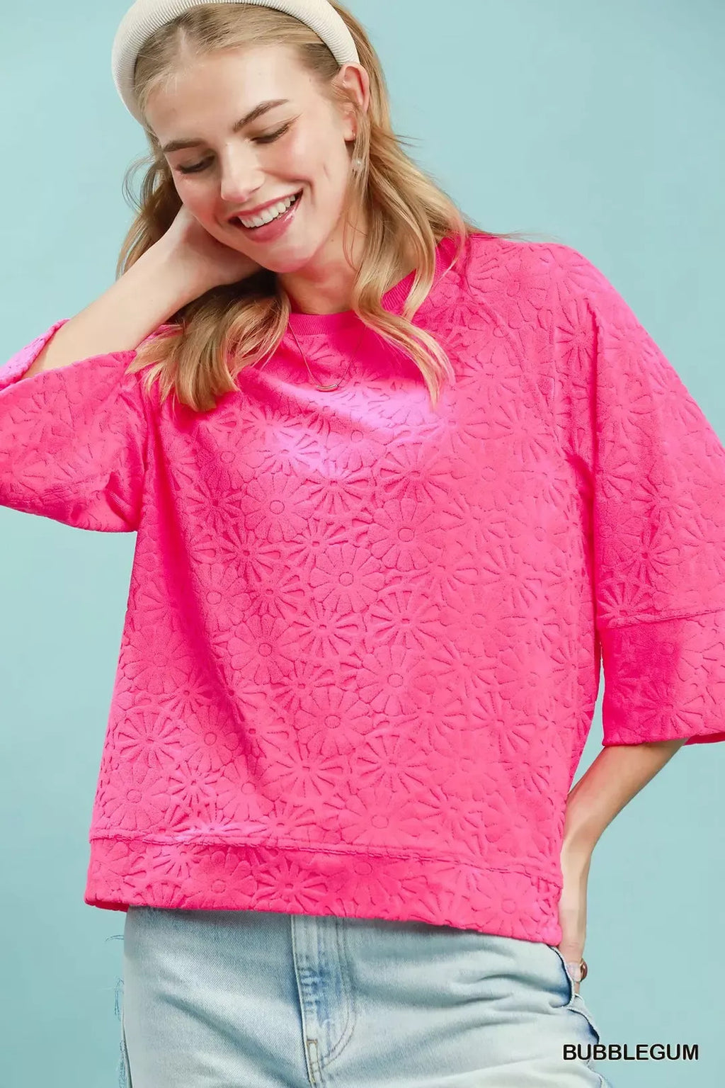 Round Neck Textured Floral Terry Blouse.