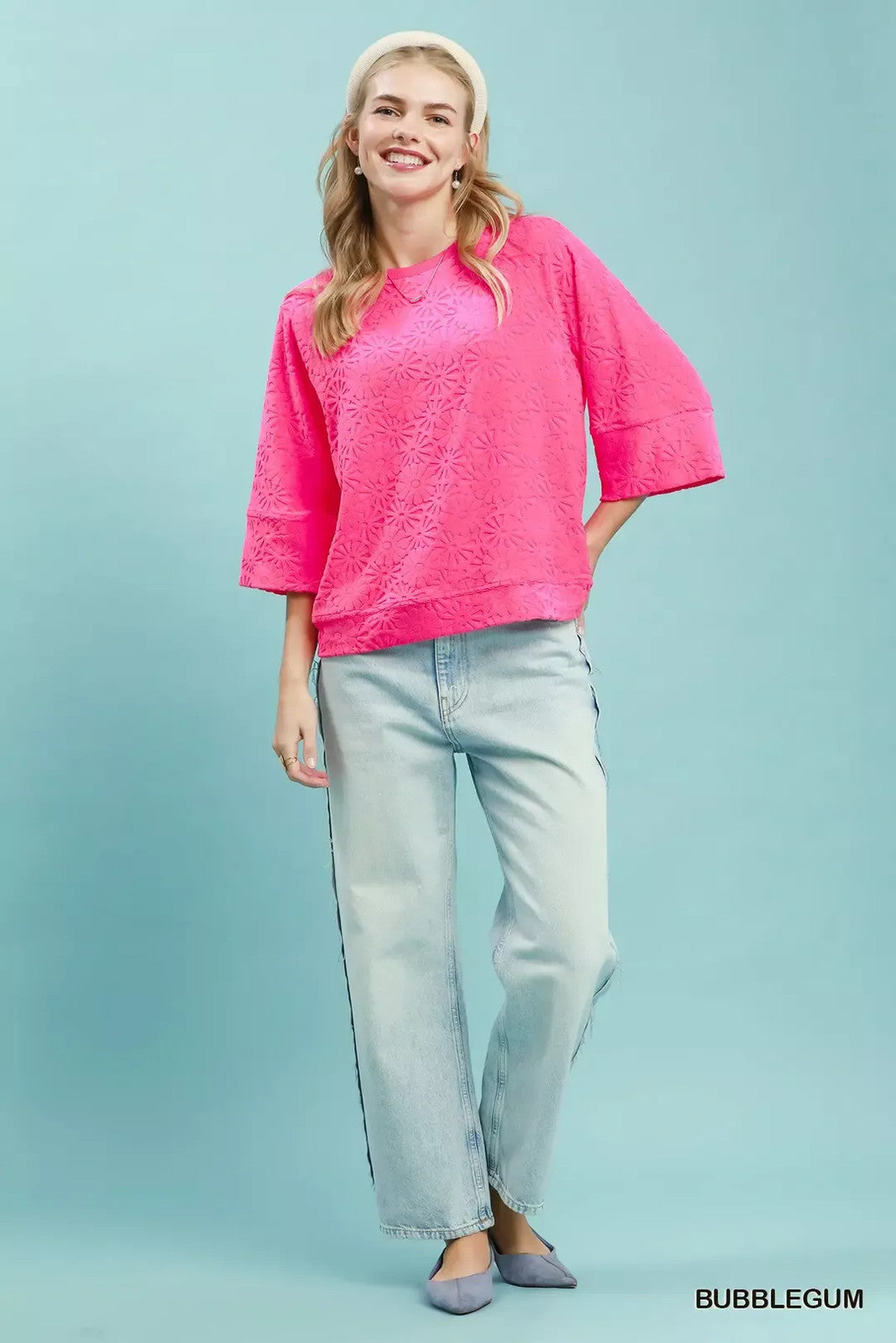 Round Neck Textured Floral Terry Blouse.